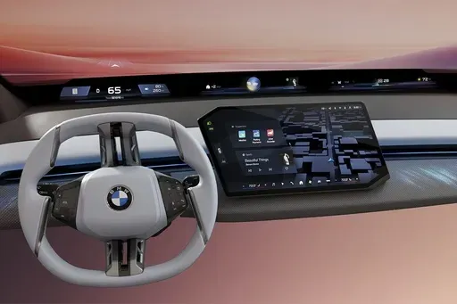 This photo provided by BMW shows the company's new Panoramic iDrive interface. It features a dash-spanning display atop the dash to help drivers better access controls and information with less distraction. (Courtesy of BMW of North America via AP)