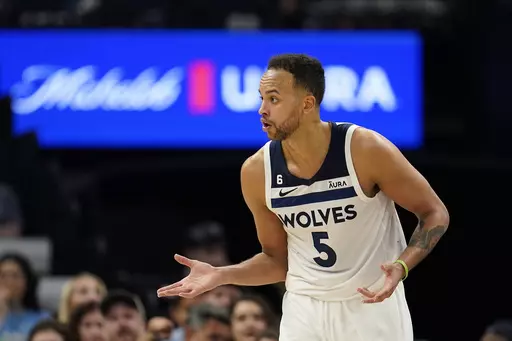 Minnesota Timberwolves forward Kyle Anderson (5) reacts during the second half of an NBA basketball game against the New Orleans Pelicans, Sunday, April 9, 2023, in Minneapolis. (AP Photo/Abbie Parr)