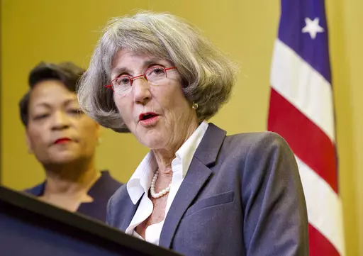 Anne Kirkpatrick speaks during a news conference after New Orleans Mayor LaToya Cantrell, back left, announced Kirkpatrick as her nominee to head the New Orleans Police Department, Sept. 11, 2023, in New Orleans. The New Orleans Police Department's progress in complying with an 11-year-old reform agreement has “accelerated dramatically,” a federal judge said Wednesday, Feb. 21, 2024, but she gave no indication when she would feel comfortable relaxing court oversight of the department. (Chris