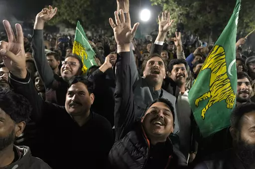Supporters of Former Prime Minister Nawaz Sharif' party 'Pakistan Muslim League-N' celebrate their party victory in the initial results of the country's parliamentary election, in Lahore, Pakistan, Friday, Feb. 9, 2024. (AP Photo/K.M. Chaudary)