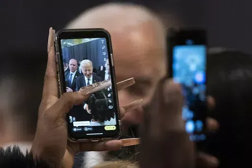 President Joe Biden is photographed by participants after delivering a speech commemorating Martin Luther King, Jr., Day, Monday, Jan. 16, 2023, in Washington. (AP Photo/Manuel Balce Ceneta, File)