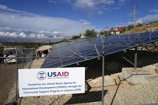 Solar panels system funded by United States Agency for International Development (USAID) are seen in the Lebanese-Syrian border town of Majdal Anjar, eastern Bekaa valley, Lebanon, Nov. 9, 2022. (AP Photo/Bilal Hussein, File)