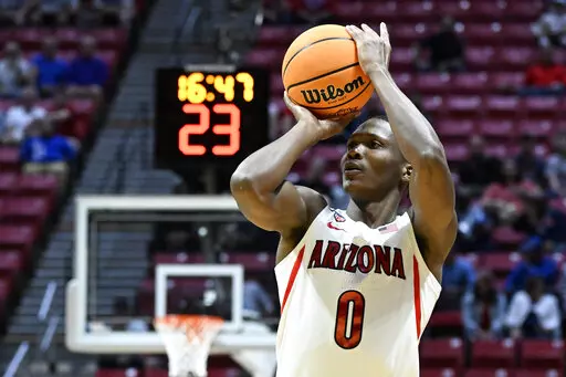 Arizona guard Bennedict Mathurin (0) shoots against Wright State during the first half of a first-round NCAA college basketball tournament game on March 18, 2022, in San Diego. Mathurin is a lottery prospect and one of the top wings in this year's NBA draft.  (AP Photo/Denis Poroy, File)