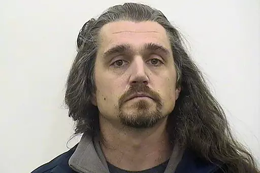 This booking image provided by Adams County, Illl., administration, shows Timothy Bliefnick of Quincy, Ill., who has been charged charged with first-degree murder in the death of his estranged wife, Rebecca Bliefnick. On Friday, Aug. 11, 2023, a judge sentenced Bliefnick, a former contestant on the television game show “Family Feud,” to life in prison after he was convicted of first-degree murder in the slaying of his estranged wife in western Illinois. (Adams County, Illl., Administration v