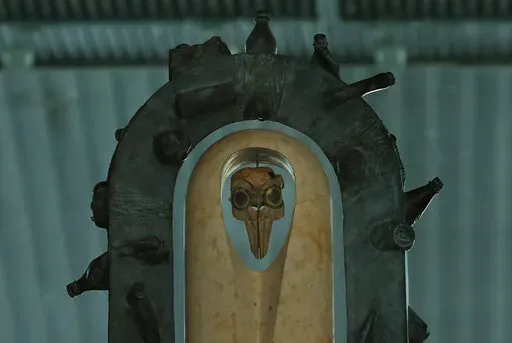 An altar constructed from recycled material of a vaquita porpoise skull is pictured during a march in support of the endangered porpoise, in Mexico City, Feb. 17, 2018.  The U.S. Trade Representative’s Office filed the first environmental complaint against Mexico Thursday, Feb. 10, 2022, for failing to protect the critically endangered vaquita marina, the world’s smallest porpoise. (AP Photo/Marco Ugarte, File)