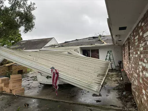 This photo provided by St. James Parish Government shows damage to property after severe weather passed the area on Friday, May 17, 2024 in Romeville, La. Gulf Coast states could experience scattered, severe thunderstorms with tornadoes, large hail and damaging winds. Heavy to excessive rainfall is possible for eastern Louisiana into central Alabama, the National Weather Service said. (Victoria Henry/St. James Parish Government via AP)