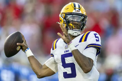 LSU quarterback Jayden Daniels throws the ball during the first half of an NCAA football game against Mississippi on Saturday, Sept. 30, 2023, in Oxford, Miss. Daniels was selected as The Associated Press college football player of the year, Thursday, Dec. 7, 2023, the school's second winner in the past five seasons. (AP Photo/Vasha Hunt, File)