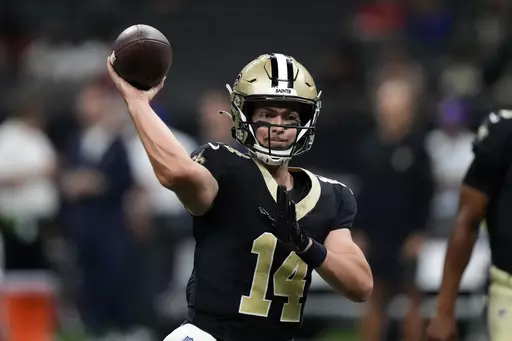 New Orleans Saints quarterback Jake Haener warms up before a preseason NFL football game against the Houston Texans, Sunday, Aug. 27, 2023, in New Orleans. (AP Photo/Gerald Herbert)