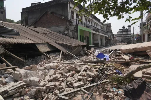 Damaged buildings are seen in the aftermath of an earthquake in Naypyitaw, Myanmar, Sunday, March 30, 2025. (AP Photo/Aung Shine Oo)