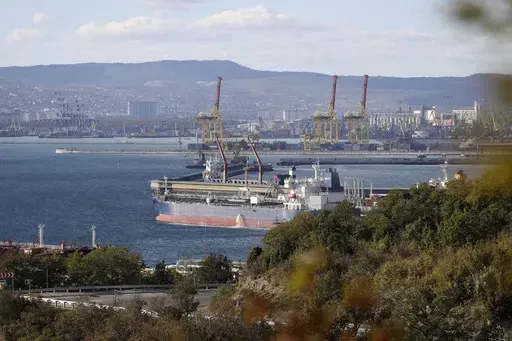 An oil tanker is moored at the Sheskharis complex, part of Chernomortransneft JSC, a subsidiary of Transneft PJSC, in Novorossiysk, Russia, on Oct. 11, 2022, one of the largest facilities for oil and petroleum products in southern Russia. For months after Ukraine's Western allies limited sales of Russian oil to $60 per barrel, the price cap was still largely symbolic. Most of Moscow's crude — its main moneymaker — cost less than that.(AP Photo, File)