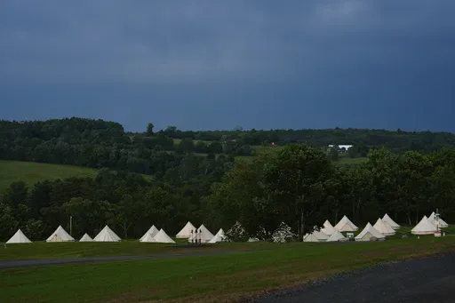 Tents are set up at Bethel Woods Center for the Arts, the site of Woodstock Music and Art Fair, Friday, June 14, 2024, in Bethel, N.Y. (AP Photo/Julia Nikhinson)