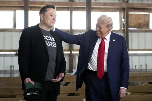 Tesla and SpaceX CEO Elon Musk, left, and Republican presidential nominee former President Donald Trump attend a campaign event at the Butler Farm Show, Oct. 5, 2024, in Butler, Pa. (AP Photo/Alex Brandon, File)