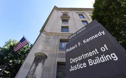 The view of the Justice Department in Washington, Thursday, Aug. 27, 2015. (AP Photo/Susan Walsh, File)
