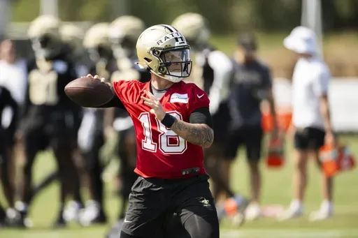 New Orleans Saints quarterback Spencer Rattler (18) throws a pass during NFL football training camp, Wednesday, July 24, 2024, in Irvine, Calif. (AP Photo/Kyusung Gong)