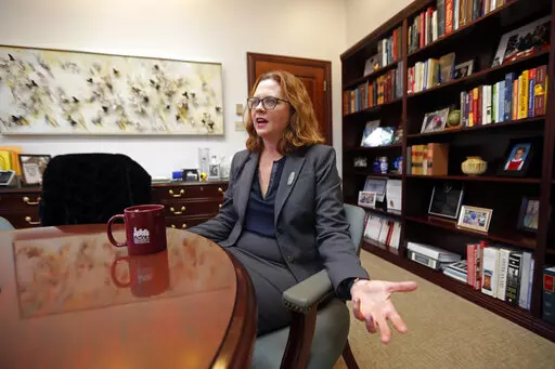 In this Wednesday, Nov. 14, 2018 photo, Loyola University New Orleans President Tania Tetlow speaks during an interview with the Associated Press in New Orleans.  The first woman and first layperson to become president of a 110-year-old Jesuit university in New Orleans will make the same history at an older Jesuit university in New York. Loyola University-New Orleans and Fordham University said in news releases Thursday, Feb. 10, 2022, that Tetlow will start July 1 as Fordham's next president.  