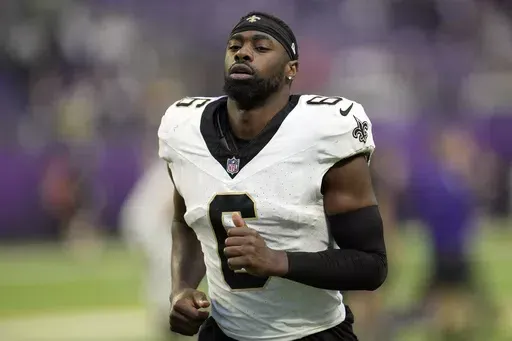 New Orleans Saints safety Marcus Maye jogs off the field after an NFL football game against the Minnesota Vikings, Nov. 12, 2023, in Minneapolis. The Miami Dolphins agreed to sign Maye on Monday, June 10, 2024, a person with knowledge of the negotiations told The Associated Press. The person spoke to the AP on condition of anonymity because the deal had not been announced. (AP Photo/Abbie Parr, File)