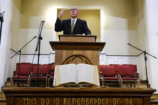 Pastor Bart Barber, president of the Southern Baptist Convention, preaches from the pulpit of the First Baptist Church of Farmersville, Texas, on Sunday, Sept. 25, 2022. For nearly a quarter-century, Barber enjoyed relative obscurity as a pastor in this town of 3,600, about 50 miles northeast of Dallas. That changed in June as delegates to the Southern Baptist Convention’s annual meeting in California, chose Barber to lead the nation’s largest Protestant denomination at a time of major crisi