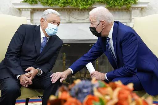 President Joe Biden meets with Mexican President Andrés Manuel López Obrador in the Oval Office of the White House in Washington, Nov. 18, 2021. The Summit of the Americas is a little more than two weeks away in Los Angeles, and there's still no clear answer on what countries are going. The confusion is a sign of chaotic preparations for the event, which the United States is hosting for the first time since the inaugural summit in 1994. Mexican President Andrés Manuel López Obrador has threa