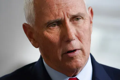 Former Vice President Mike Pence sits for an interview with the Associated Press, Nov. 16, 2022, in New York. Pence has been subpoenaed by the special counsel overseeing investigations into efforts by former President Donald Trump and his allies to overturn the results of the 2020 election, according to a person with direct knowledge of the event, Thursday, Feb. 9, 2023. (AP Photo/John Minchillo, File)