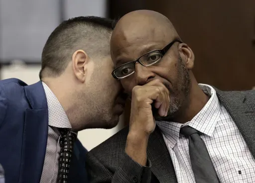 Christopher Dunn, right, listens to his attorney Justin Bonus from New York City during the first day of his hearing to decide whether to vacate his murder conviction, Tuesday, May 21, 2024, at the Carnahan Courthouse in St. Louis. A Missouri judge on Monday, July 24, 2024, overturned the conviction of Dunn, who has spent more than 30 years in prison for a killing he has long contended he didn’t commit. (Laurie Skrivan/St. Louis Post-Dispatch via AP, Pool, File)