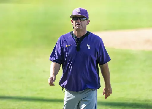 LSU head coach Jay Johnson visits the mound during an NCAA college baseball tournament super regional game against Kentucky in Baton Rouge, La., Sunday, June 11, 2023. (Scott Clause/The Daily Advertiser via AP)