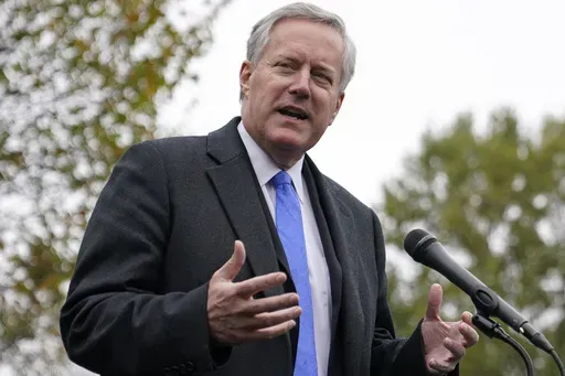 White House chief of staff Mark Meadows speaks with reporters outside the White House, Monday, Oct. 26, 2020, in Washington. (AP Photo/Patrick Semansky, File)
