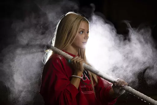 Nebraska NCAA college pole vaulter Jessica Gardner poses Thursday, March 9, 2023, in Lincoln, Neb. As has been the case with other female athletes who are monetizing their social media followings, it's typical for her looks to be the subject of comments on her videos, comments that can range from genuinely complimentary to inappropriate — or worse. (AP Photo/Rebecca S. Gratz)