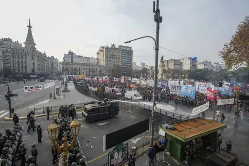 Police disperse anti-government protesters with water canons outside Congress, as lawmakers debate a reform bill of austerity measures promoted by Argentine President Javier Milei in Buenos Aires, Argentina, June 12, 2024. Milei scrapped price controls and slashed subsidies, causing prices to skyrocket in a country that already had among the world’s highest inflation rates. (AP Photo/Natacha Pisarenko, File)