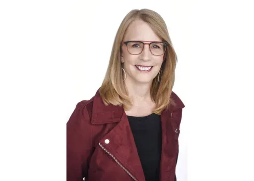 This undated file photo provided by NerdWallet shows Liz Weston, a columnist for personal finance website NerdWallet.com. House prices are soaring, and homeowners have a lot of value built up between what’s left on the mortgage and what their house is worth. Still, there are reasons to pause before cashing out that equity. (NerdWallet via AP, File)