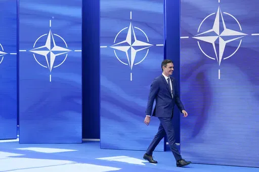 Spain's Prime Minister Pedro Sanchez arrives to pose for photos with NATO Secretary General Jens Stoltenberg at the NATO summit at NATO headquarters in Brussels, Monday, June 14, 2021. Russia’s invasion of Ukraine is certain to dominate an upcoming NATO summit in Madrid. But host nation Spain and other members are quietly pushing the Western alliance to consider how mercenaries aligned with Russian President Vladimir Putin are spreading Moscow’s influence in Africa. (AP Photo/Patrick Semansk