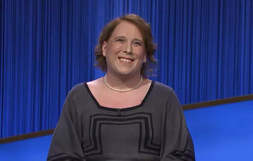 This image provided by Jeopardy Productions, Inc. shows game show champion Amy Schneider on the set of "Jeopardy!" Schneider is the first trans person to qualify for the show's Tournament of Champions. (Jeopardy Productions, Inc. via AP)
