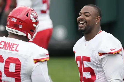 Kansas City Chiefs defensive tackle Chris Jones (95) talks with a teammate during an NFL football practice Thursday, Feb. 6, 2025, in New Orleans, ahead of Super Bowl 59 against the Philadelphia Eagles. (AP Photo/Brynn Anderson)