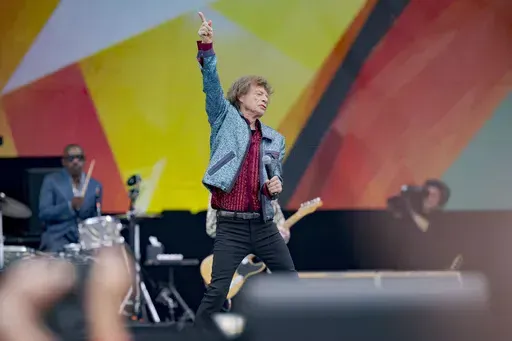 Mick Jagger, of the Rolling Stones, performs during the New Orleans Jazz and Heritage Festival in New Orleans, Thursday, May 2, 2024. (AP Photo/Matthew Hinton)