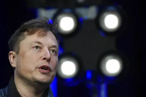 Elon Musk speaks at the SATELLITE Conference and Exhibition March 9, 2020, in Washington. Trading in shares of Twitter were halted after the stock spiked, Tuesday, Oct. 4, 2022 on reports that Musk would proceed with his $44 billion deal to buy the company after months of legal battles. (AP Photo/Susan Walsh, File)