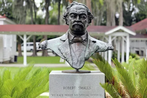 A bust of Robert Smalls, who will soon be the first African American individual with a statue at the South Carolina Statehouse, is displayed Reconstruction Era National Historic Park, Thursday, Sept. 12, 2024, in Beaufort, S.C. (AP Photo/Jeffrey Collins)