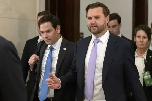 Sen. Marco Rubio, R-Fla., left, and Vice President-elect Sen. JD Vance, R-Ohio, walk together after leaving Vance's office on Capitol Hill, Thursday, Nov. 21, 2024, in Washington. (AP Photo/Mark Schiefelbein)