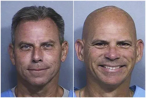 This combination of two booking photos provided by the California Department of Corrections shows Erik Menendez, left, and Lyle Menendez. (California Dept. of Corrections via AP,File)