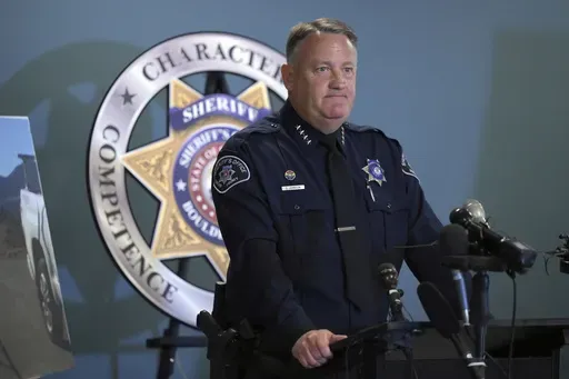 Boulder County Sheriff Curtis Johnson explains about cause of fire during a press conference on the investigative outcome into the cause and origin of the 2021 Marshall Fire, Thursday, June 8 , 2023, at the Boulder County Sheriff's Office in Boulder, Colo. Authorities say embers from a smoldering scrap wood fire outside a home days earlier and a sparking power line separately caused a Colorado wildfire fanned by high winds that destroyed nearly 1,100 homes and left two people dead. (Hyoung Chang