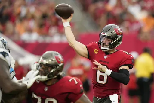 Tampa Bay Buccaneers quarterback Baker Mayfield passes against the Carolina Panthers during the first half of an NFL football game Sunday, Dec. 29, 2024, in Tampa, Fla. (AP Photo/Chris O'Meara)