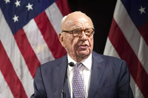 Rupert Murdoch introduces Secretary of State Mike Pompeo during the Herman Kahn Award Gala, in New York, Oct. 30, 2018. A voting technology company suing Fox News is arguing that Fox Corp. leaders Rupert and Lachlan Murdoch played a leading role in deciding to air false claims that the technology helped “steal” the 2020 presidential election from former President Donald Trump, according to a filing Monday, March 6, 2023. (AP Photo/Mary Altaffer, File)