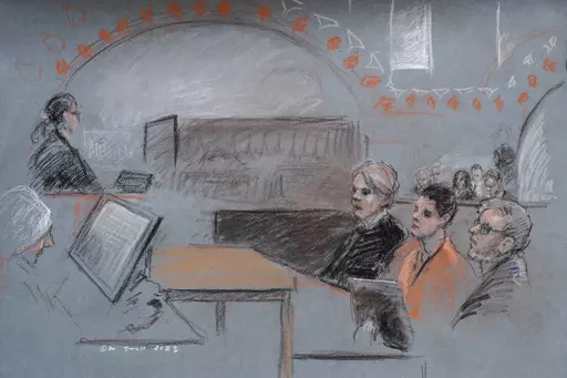 In this artist depiction, Massachusetts Air National Guardsman Jack Teixeira, seated second from right, appears in U.S. District Court, in Boston, April 19, 2023. Teixeira, accused of leaking highly classified military documents on a social media platform, is due back in court on June 21, after being indicted on federal felony charges. (Margaret Small via AP)