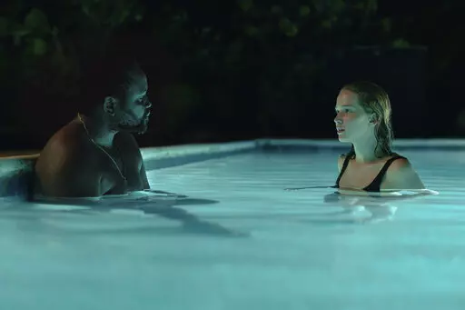 This image released by Apple TV+ shows Brian Tyree Henry, left, and Jennifer Lawrence in "Causeway." (Wilson Webb/Apple TV+ via AP)