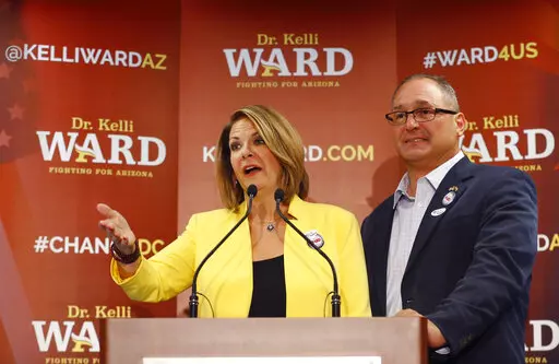 Kelli Ward, with her husband Mike at her side, concedes to Sen. John McCain, R-Ariz. in the race for the Republican nomination to U.S. Senate, at her primary night party at a hotel in Scottsdale, Ariz., on Aug. 30, 2016. A federal appeals court panel has upheld a ruling Saturday, Oct. 22, 2022, requiring phone records of the Arizona Republican Party's leader to be turned over to the House committee investigating the Jan. 6, 2021, insurrection at the U.S. Capitol. (David Kadlubowski/The Arizona R