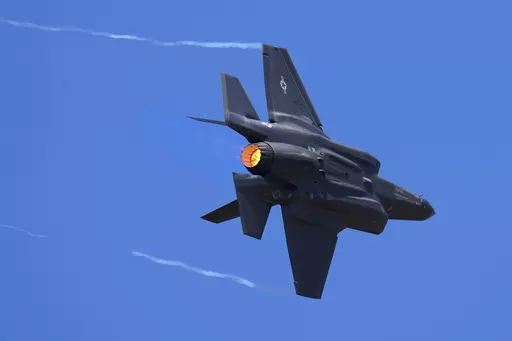 U.S. Air Force fighter aircraft F-35 performs aerobatic maneuvers on the second day of the Aero India 2023 at Yelahanka air base in Bengaluru, India, Tuesday, Feb. 14, 2023. An independent Sweden-based watchdog says the world military spending has grown for the eighth consecutive year in 2022 to an all-time high of $2240 billion leading to a sharp rise of 13% taking place in Europe, chiefly due to Russian and Ukrainian expenditure. (AP Photo/Aijaz Rahi, File)
