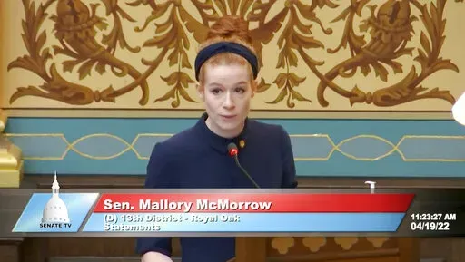 This image taken from video provided by the Michigan Senate shows Sen. Mallory McMorrow speaking on Tuesday, April 19, 2022. The Michigan lawmaker, mother and LGBTQ rights backer who was falsely accused of wanting to "groom' kids" by a Republican colleague drew widespread praise for defending herself in a 5-minute speech from the Senate floor. McMorrow, who has not gotten an apology, said she will not stop forcefully addressing such attacks. (Michigan Senate via AP)