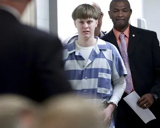 Dylann Roof enters the court room at the Charleston County Judicial Center to enter his guilty plea on murder charges on April 10, 2017, in Charleston, S.C. The Supreme Court has rejected an appeal from Roof, who challenged his death sentence and conviction in the 2015 racist slayings of nine members of a Black South Carolina congregation. (Grace Beahm/The Post And Courier via AP, Pool, File)