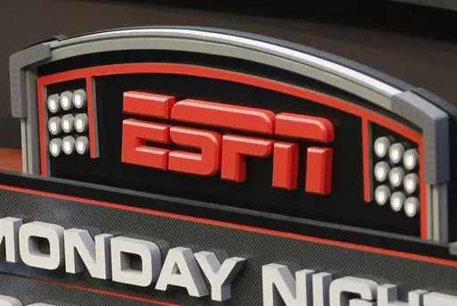The ESPN logo is seen, Sept. 16, 2013, prior to an NFL football game between the Cincinnati Bengals and the Pittsburgh Steelers in Cincinnati. ESPN Bet, a rebranded sports-gambling app owned by Penn Entertainment, is set to launch Tuesday, Nov. 14, 2023. (AP Photo/David Kohl, File)