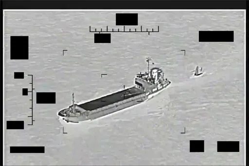 This photo released by the U.S. Navy shows the Iranian Revolutionary Guard ship Shahid Bazair, left, towing a U.S. Navy Saildrone Explorer in the Persian Gulf on Tuesday, Aug. 30, 2022. The U.S. Navy's Mideast-based 5th Fleet said Tuesday that Iran's paramilitary Revolutionary Guard seized and later let go of a U.S. sea drone in the Persian Gulf. Iran did not immediately acknowledge the incident, though it comes amid heightened tensions over Tehran's tattered nuclear deal with world powers. (U.S