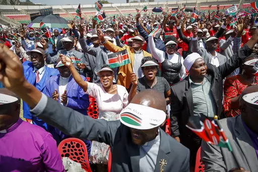 Kenyans attend a national day of prayer event held at Nyayo stadium in the capital Nairobi, Kenya, Tuesday, Feb. 14, 2023. With the prospect of a sixth consecutive failed rainy season in the east and Horn of Africa, Kenya's president is hoping the heavens will finally open with the help of a national day of mass prayer. (AP Photo/Brian Inganga)