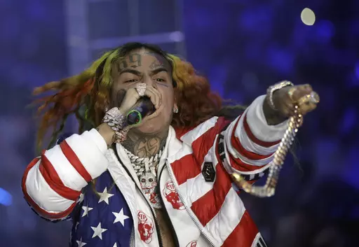 Rapper Daniel Hernandez, known as Tekashi 6ix9ine, performs during the Philipp Plein Women's 2019 Spring-Summer Collection, unveiled during Fashion Week in Milan, Italy, Sept. 21, 2018. Palm Beach County, Fla., Sheriff's investigators said an altercation occurred Tuesday night, March 21, 2023, between Hernandez and several people. Hernandez's injuries were not considered life-threatening. (AP Photo/Luca Bruno, File)